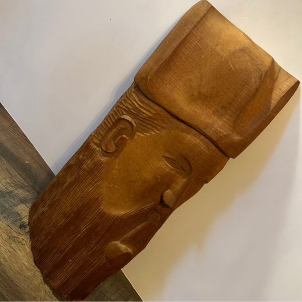 Wooden hand carved wall art.